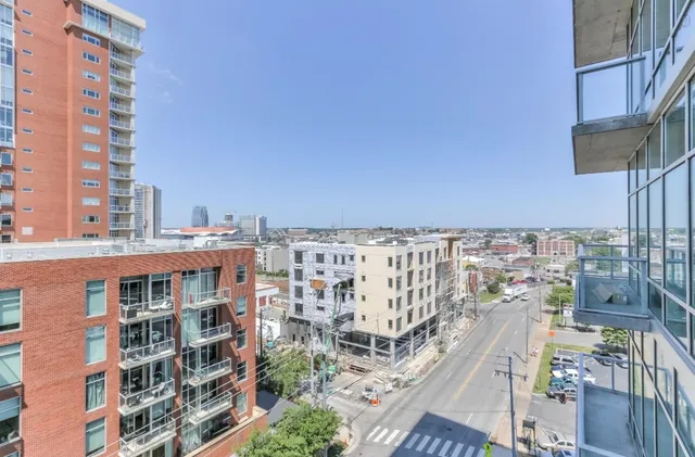 a view of a city with tall buildings