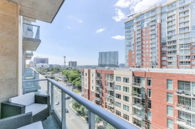 a view of a building from a balcony