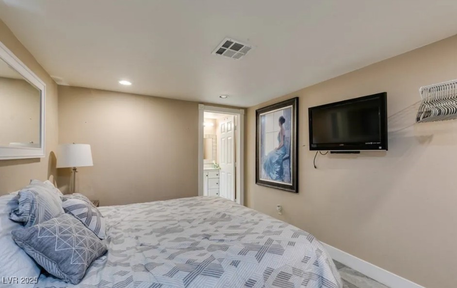 6520 Turtle Hill Road Las Vegas, NV 89110 - Photo 41 of 59 Bedroom with ensuite bathroom, carpet flooring, and recessed lighting