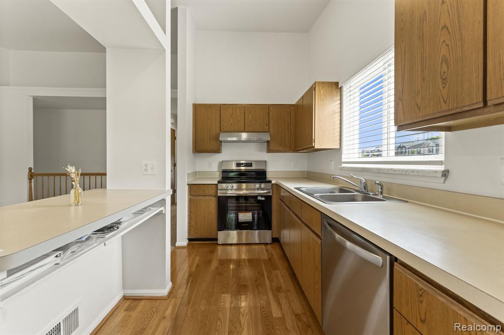 62402 Raleigh Court, Unit 6 South Lyon, MI 48178 - Photo 7 of 21 Gallery Image 7