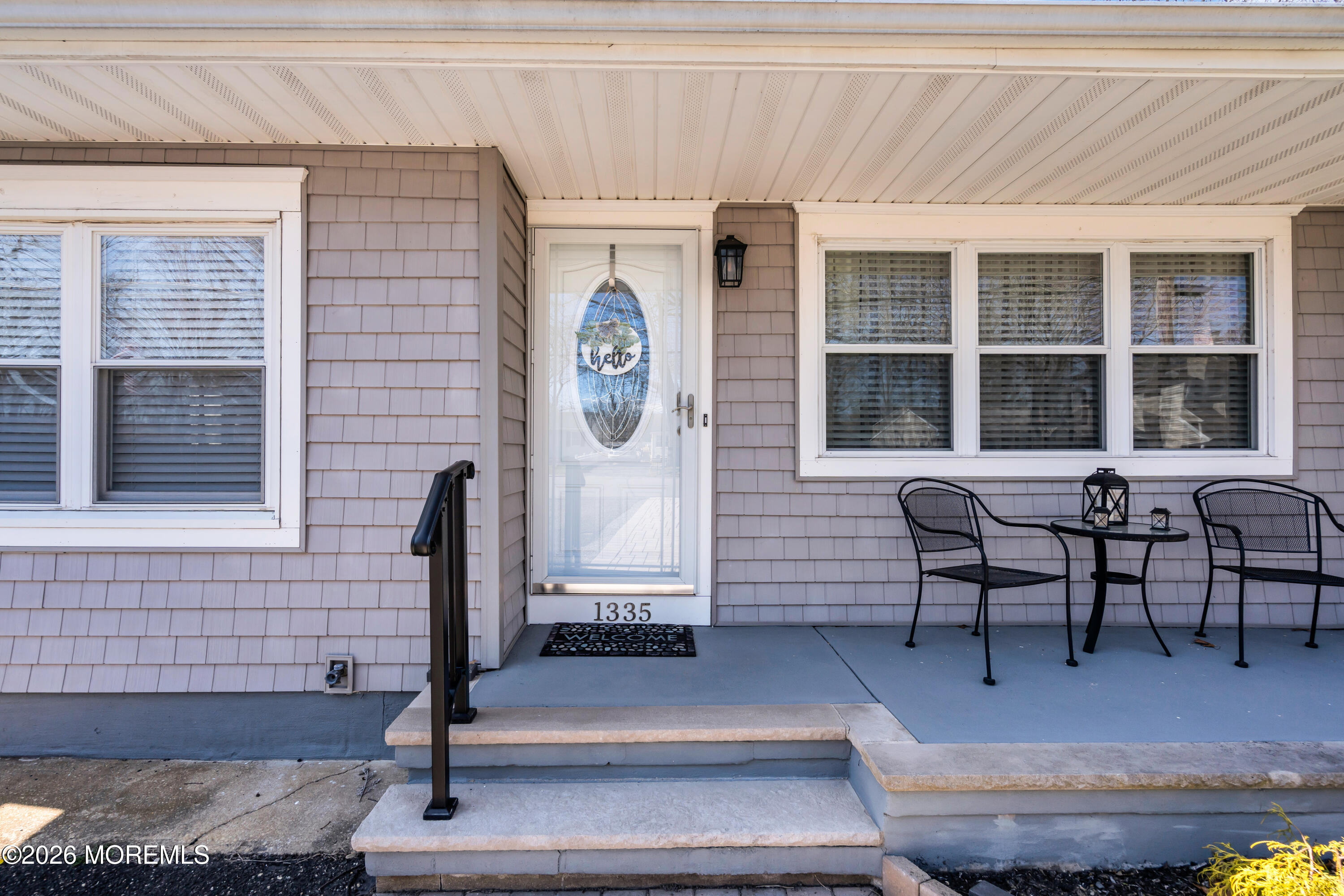 1335 Sunrise Avenue Point Pleasant, NJ 08742 - Photo 12 of 51 a view of a entryway door front of house