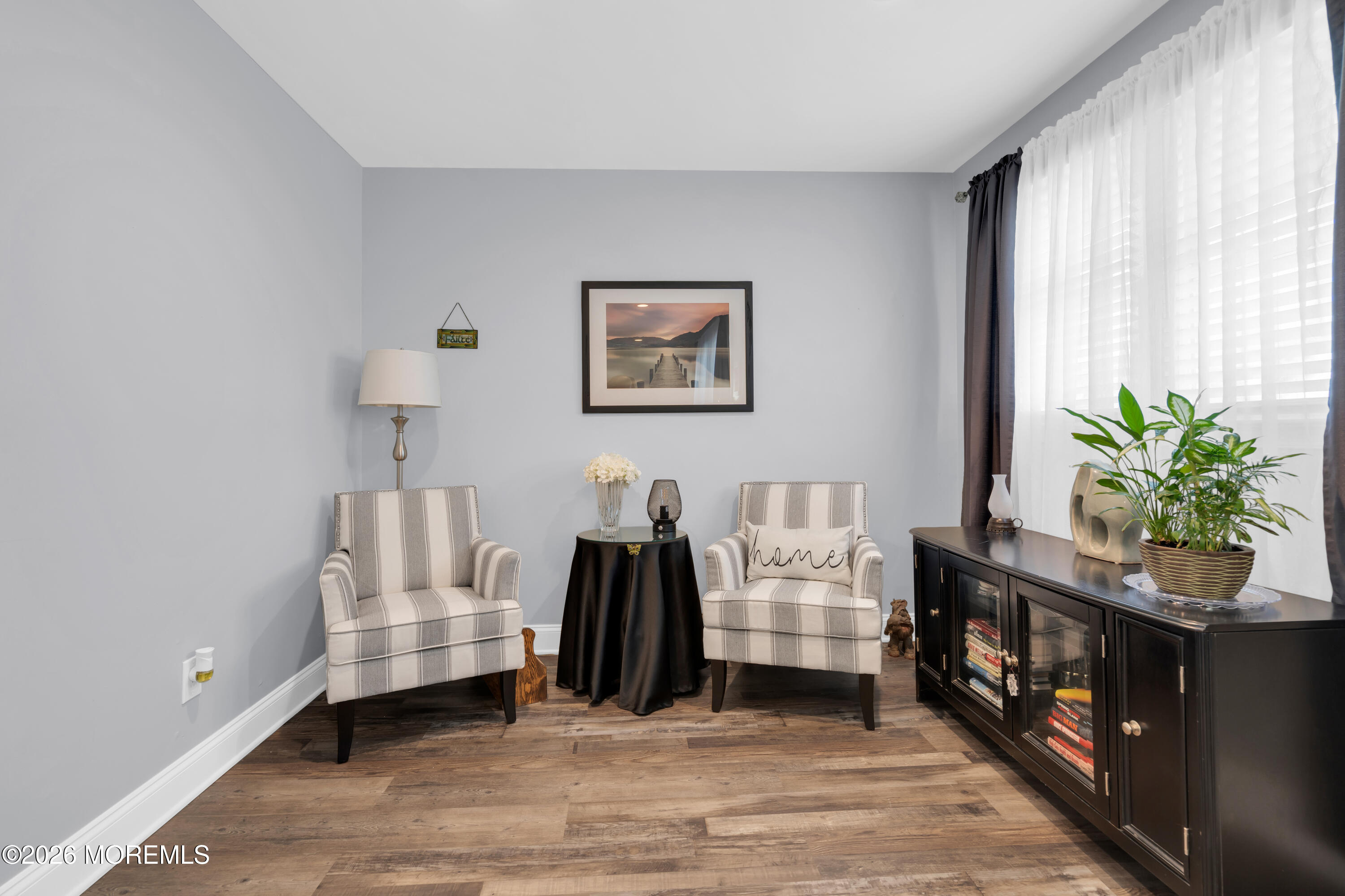 1335 Sunrise Avenue Point Pleasant, NJ 08742 - Photo 20 of 51 a living room with furniture and a potted plant