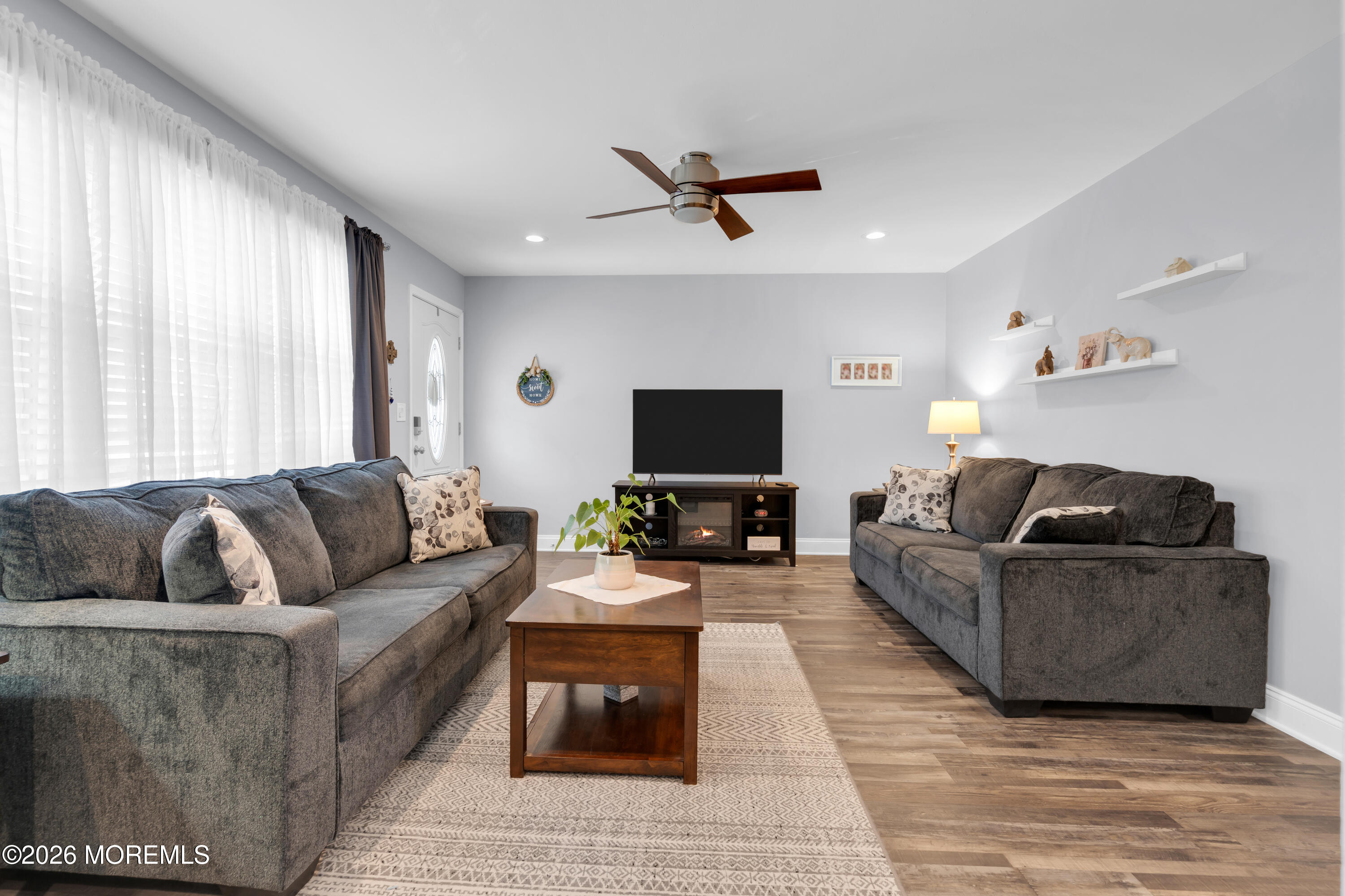 1335 Sunrise Avenue Point Pleasant, NJ 08742 - Photo 21 of 51 a living room with furniture and a flat screen tv