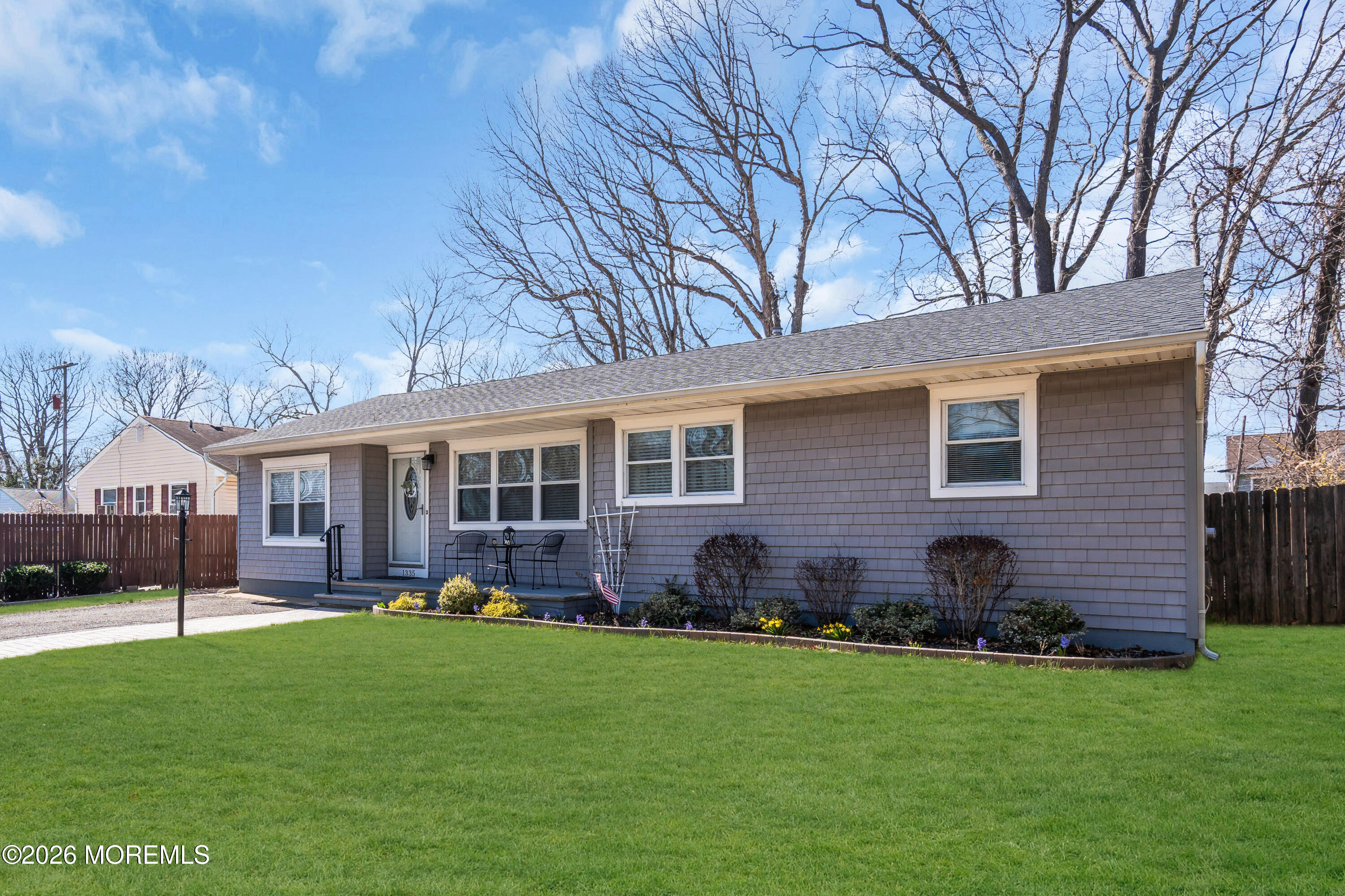 1335 Sunrise Avenue Point Pleasant, NJ 08742 - Photo 3 of 51 a view of a house with a yard and plants