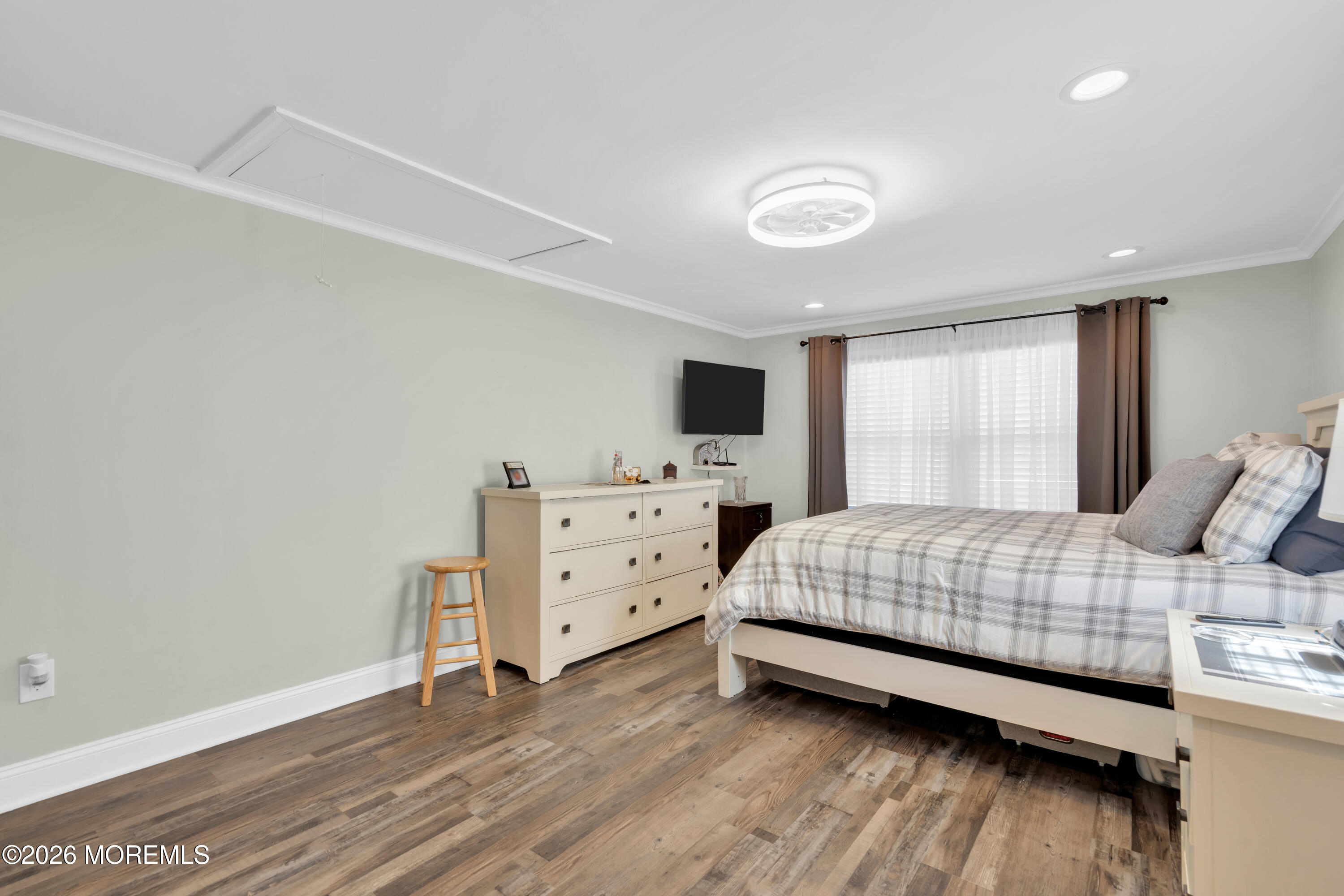 1335 Sunrise Avenue Point Pleasant, NJ 08742 - Photo 32 of 51 a bedroom with a bed and wooden floor