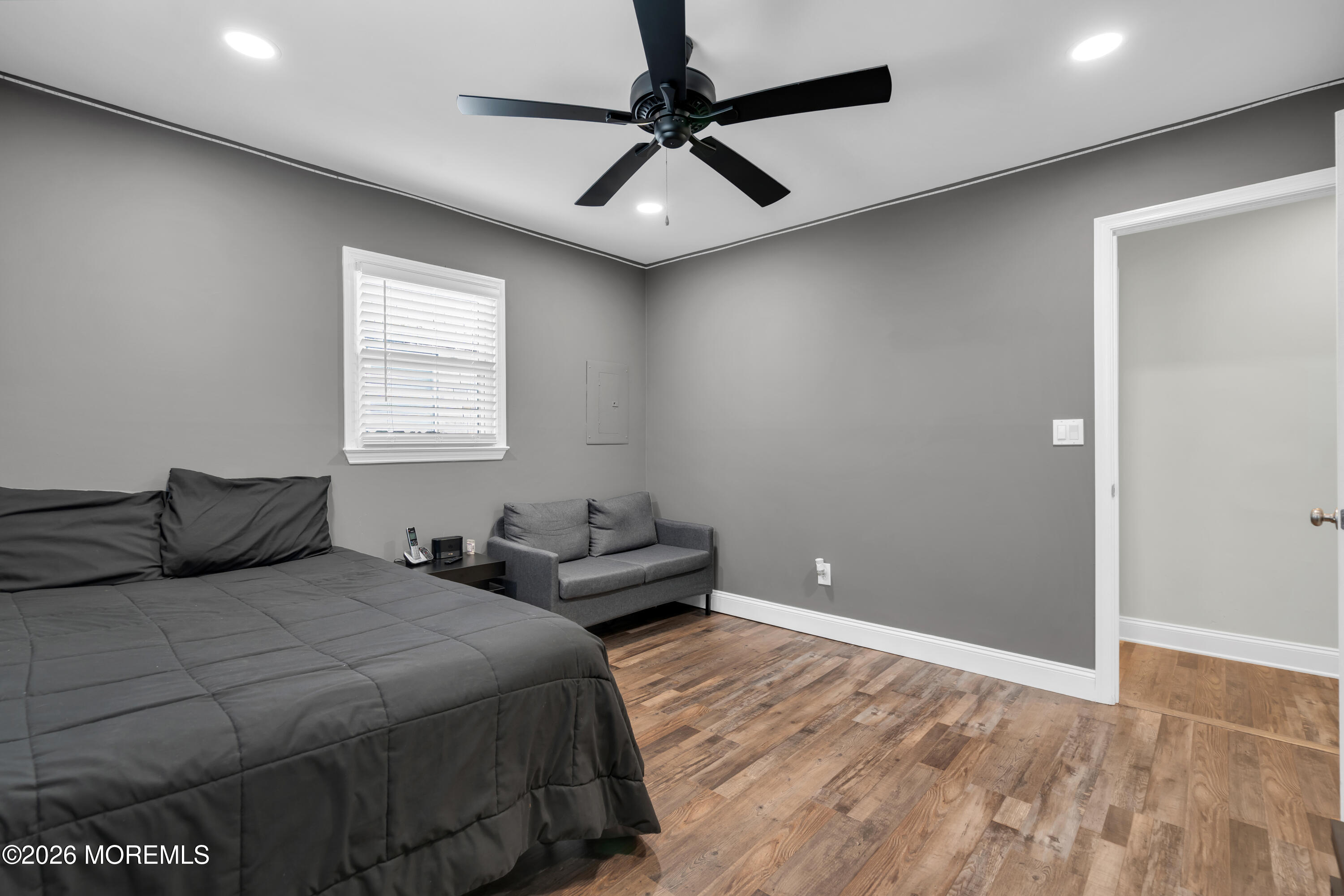1335 Sunrise Avenue Point Pleasant, NJ 08742 - Photo 39 of 51 a bedroom with a bed and a ceiling fan