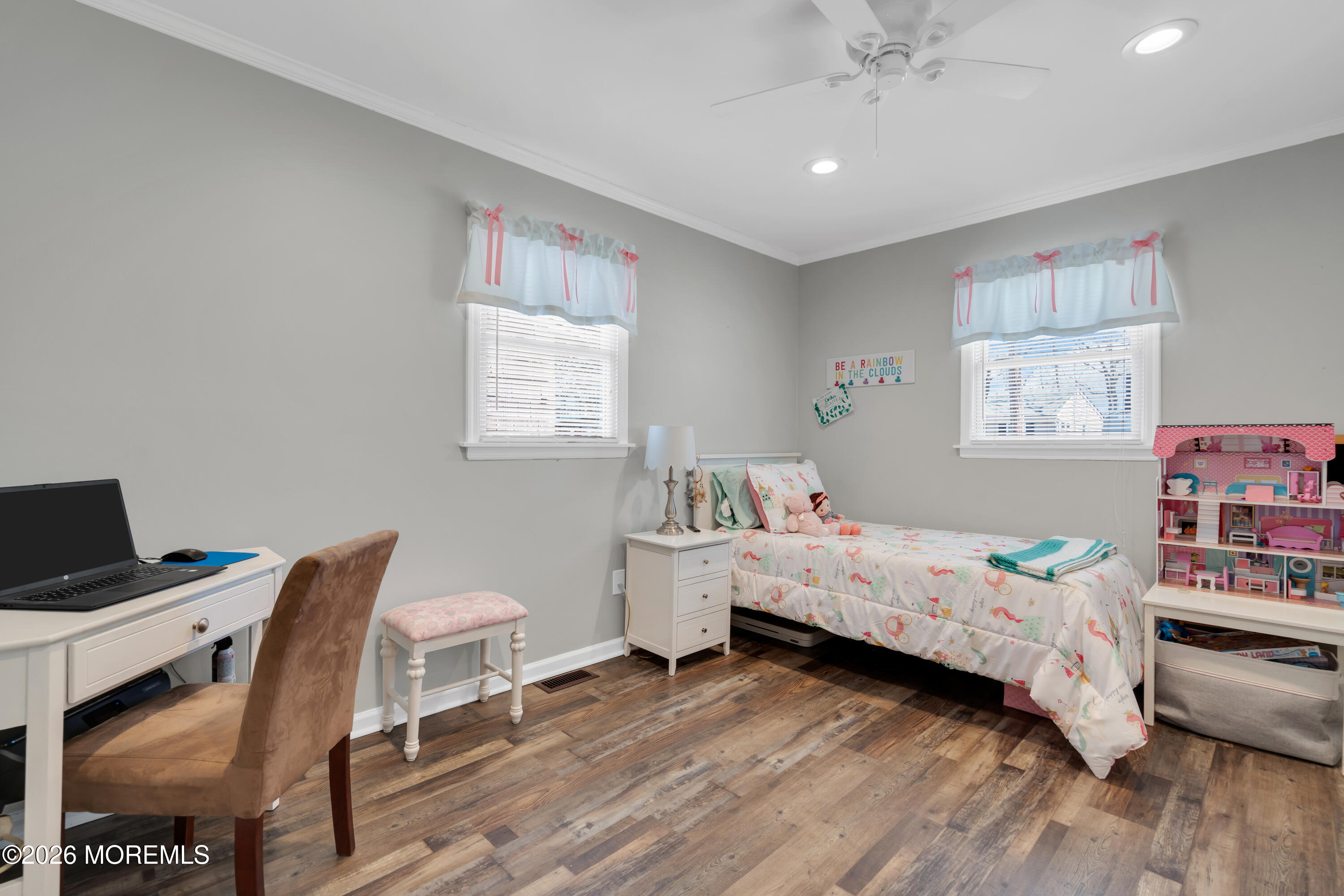 1335 Sunrise Avenue Point Pleasant, NJ 08742 - Photo 40 of 51 a bedroom with a bed and a chair in it