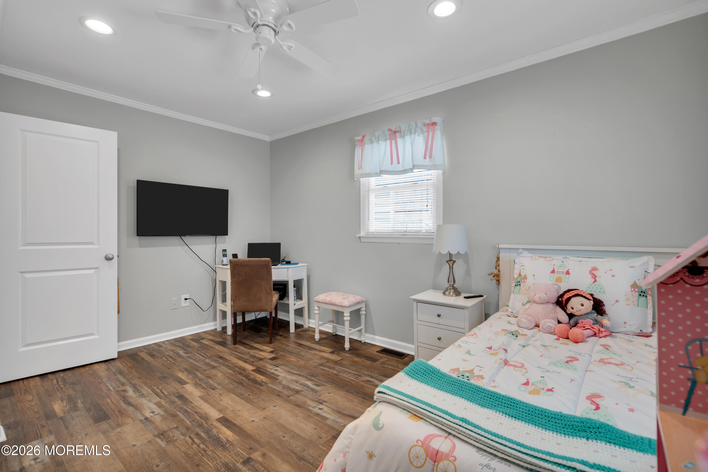 1335 Sunrise Avenue Point Pleasant, NJ 08742 - Photo 42 of 51 a bedroom with furniture and a flat screen tv
