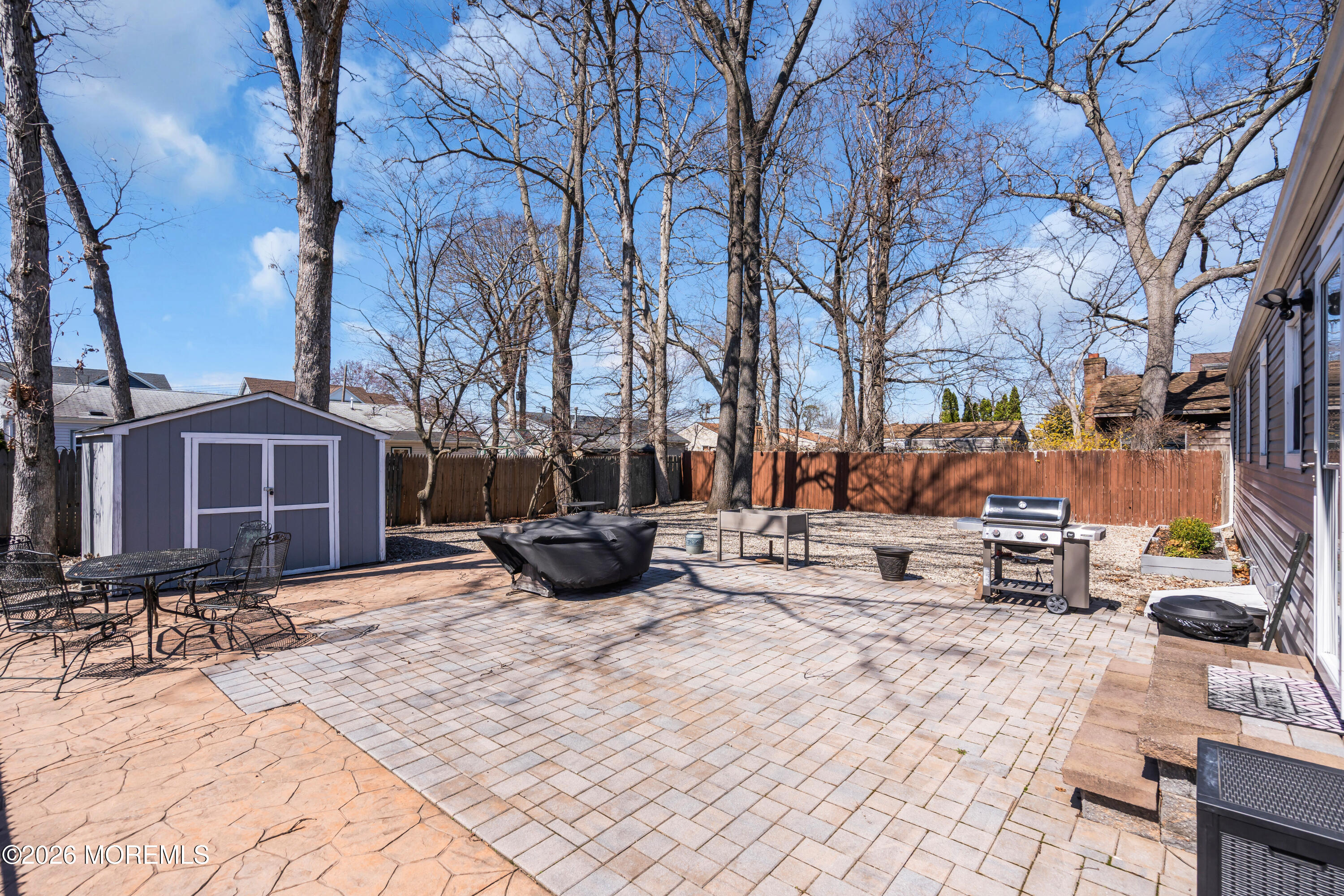 1335 Sunrise Avenue Point Pleasant, NJ 08742 - Photo 43 of 51 a view of a terrace with chairs and a fire pit