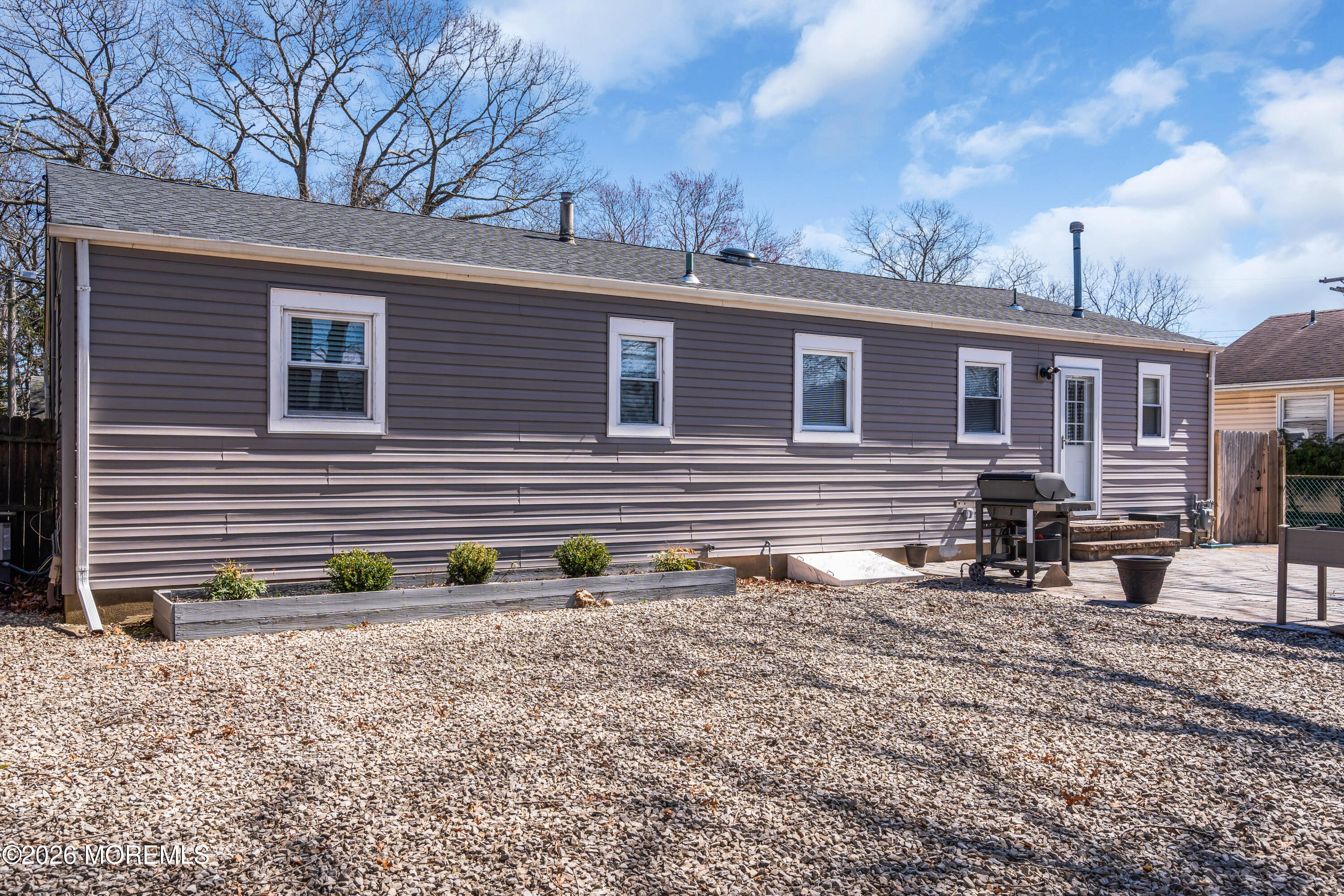 1335 Sunrise Avenue Point Pleasant, NJ 08742 - Photo 48 of 51 a view of a house with a yard and sitting area