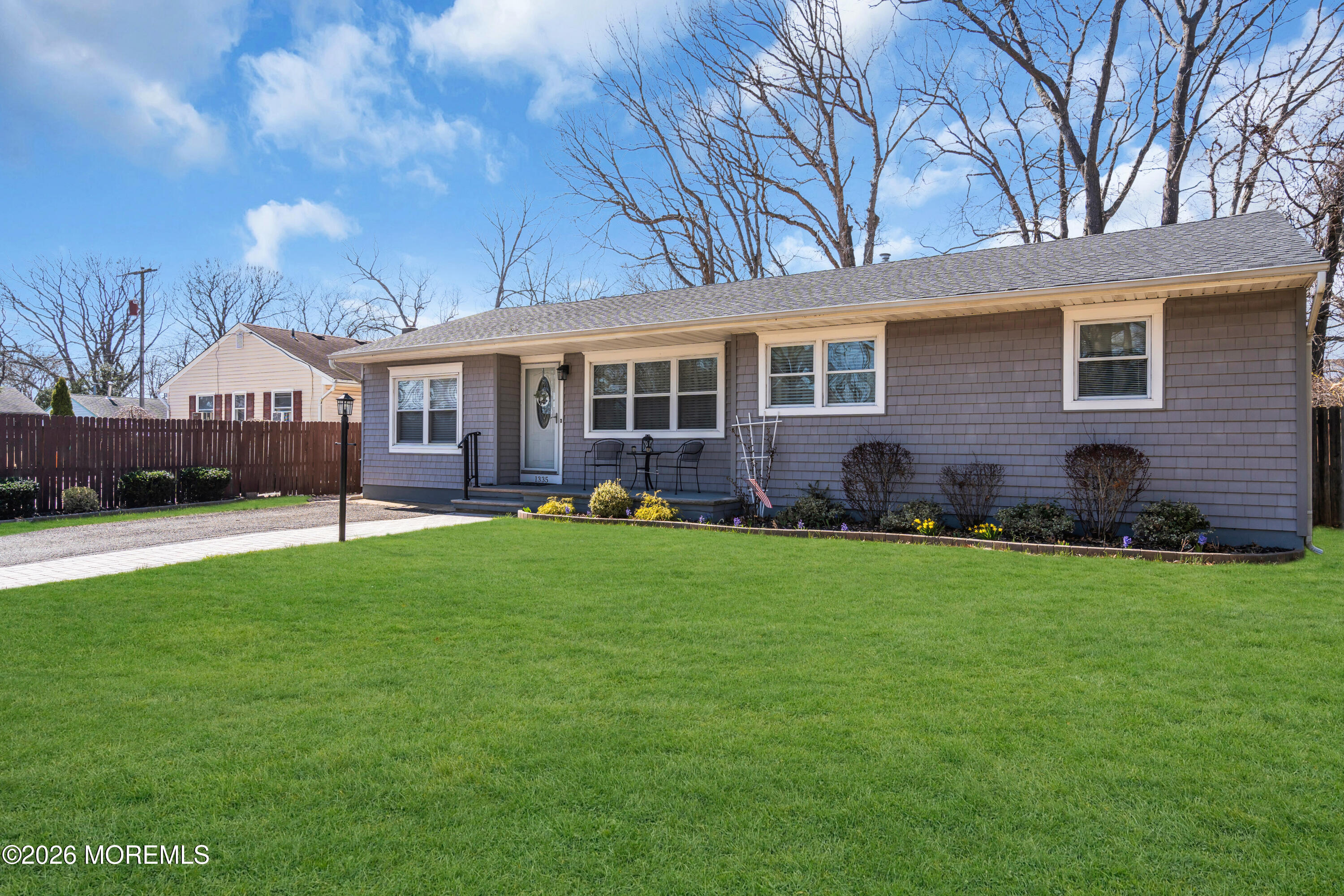 1335 Sunrise Avenue Point Pleasant, NJ 08742 - Photo 9 of 51 a view of a house with a yard and sitting area