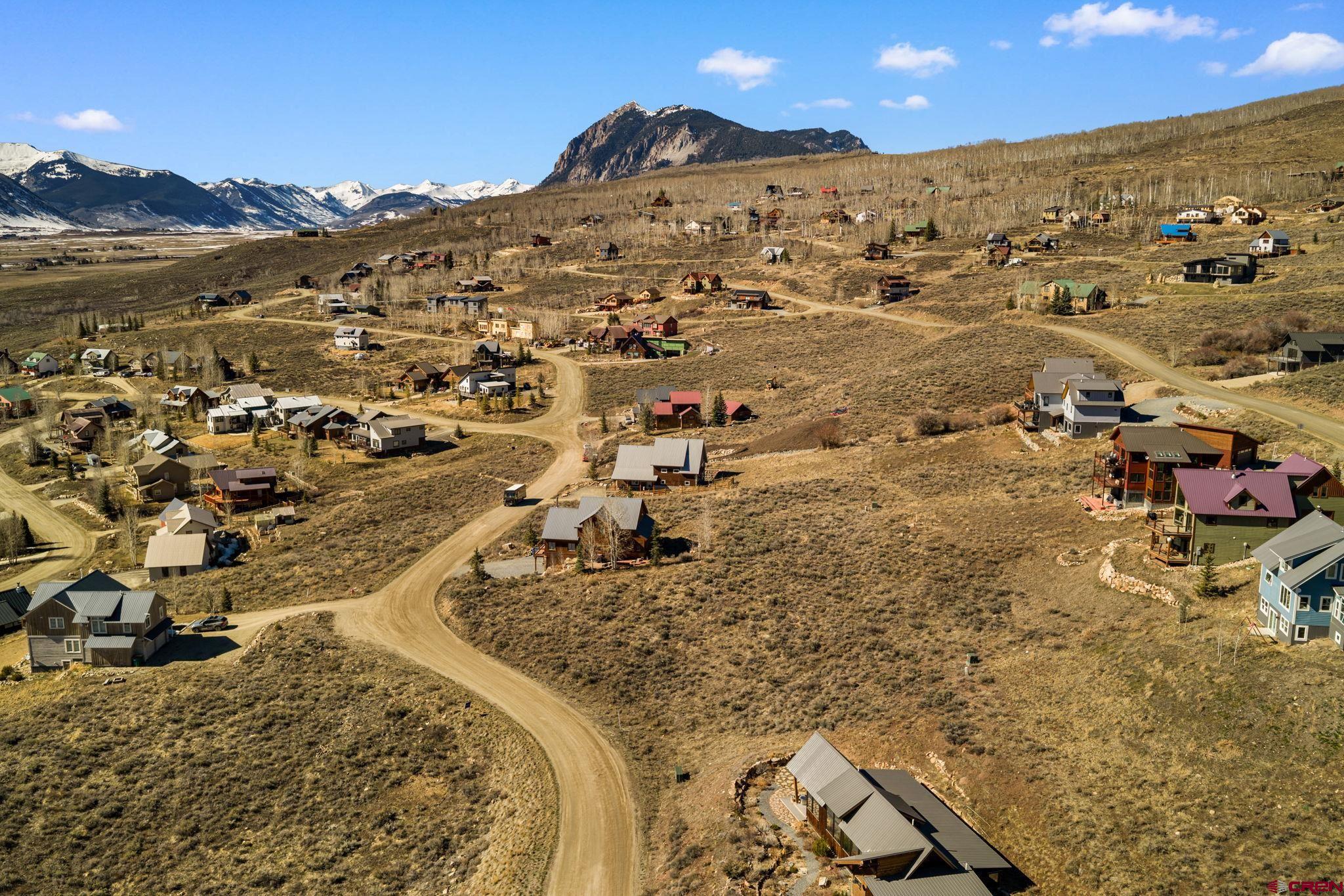 243 Zeligman Street Crested Butte, CO 81224 - Photo 2 of 13 an aerial view of residential houses with outdoor space
