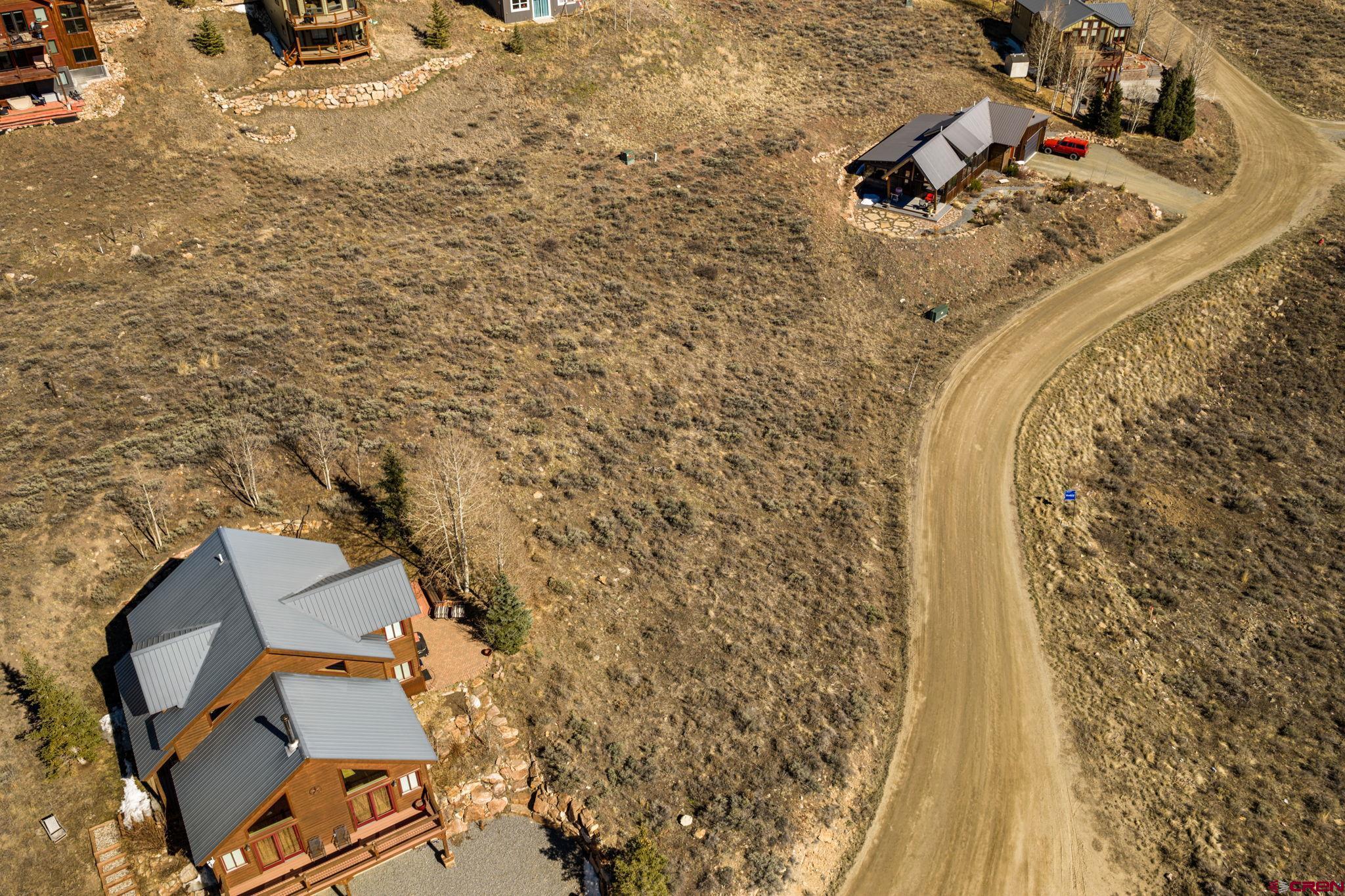 243 Zeligman Street Crested Butte, CO 81224 - Photo 3 of 13 an aerial view of residential house with parking space