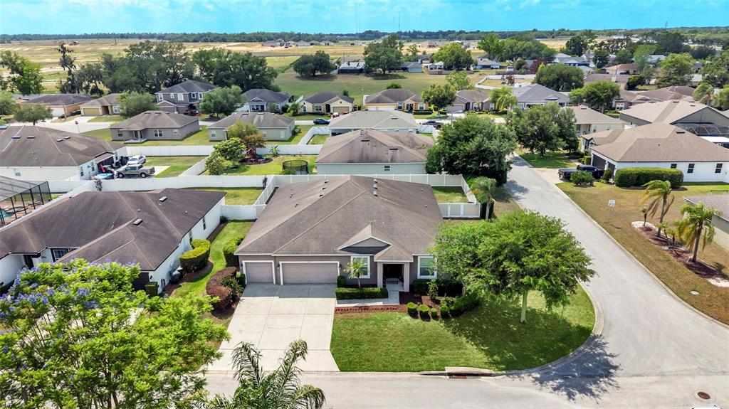 4105 Berkshire Loop Lakeland, FL 33813 - Photo 2 of 41 an aerial view of a house with a garden