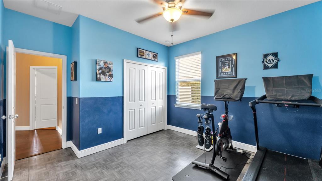 4105 Berkshire Loop Lakeland, FL 33813 - Photo 32 of 41 a view of a room with gym equipment