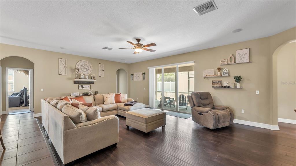 4105 Berkshire Loop Lakeland, FL 33813 - Photo 5 of 41 a living room with furniture and a large window