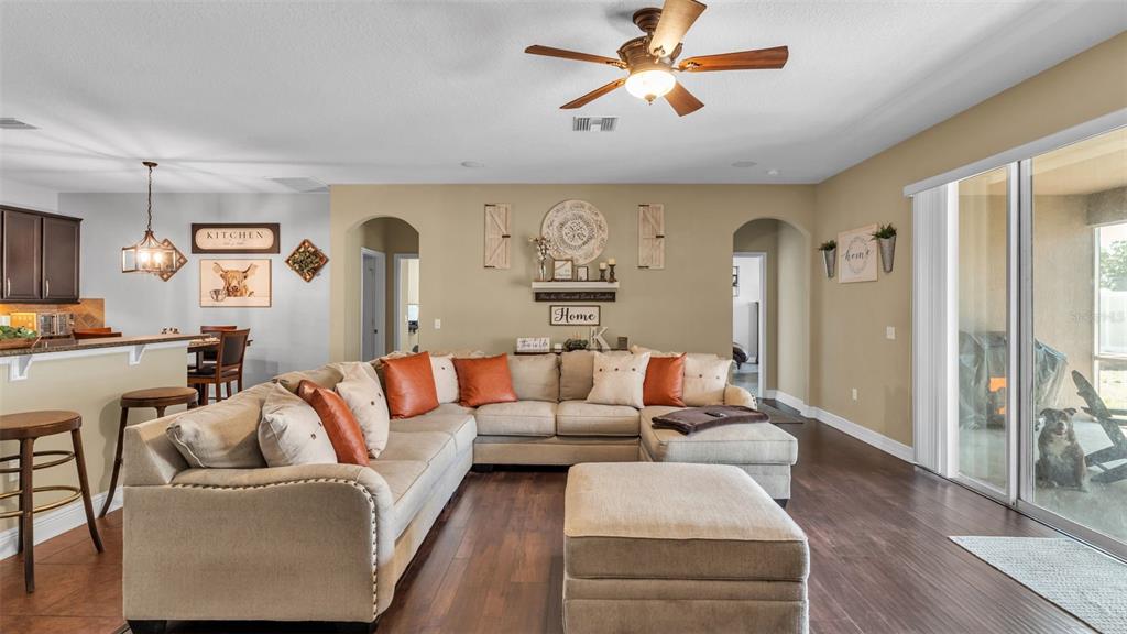 4105 Berkshire Loop Lakeland, FL 33813 - Photo 8 of 41 a living room with furniture and a large window