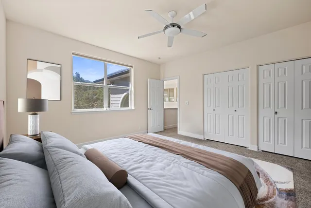 a view of a house with a yard in front of it