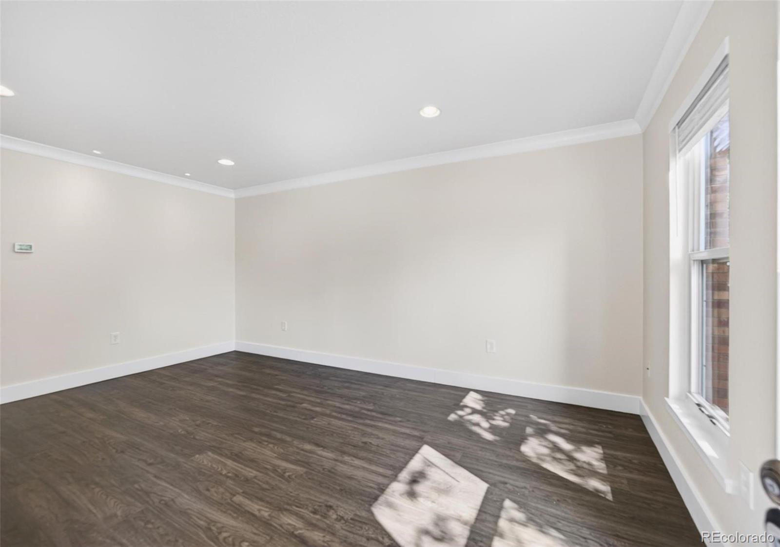 1150 Inca Street, Unit 46 Denver, CO 80204 - Photo 4 of 45 a view of wooden floor