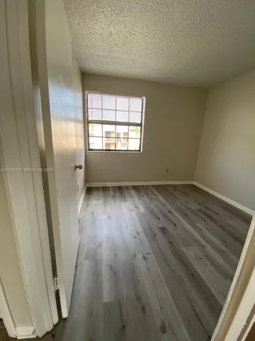 a car parked in front of a house