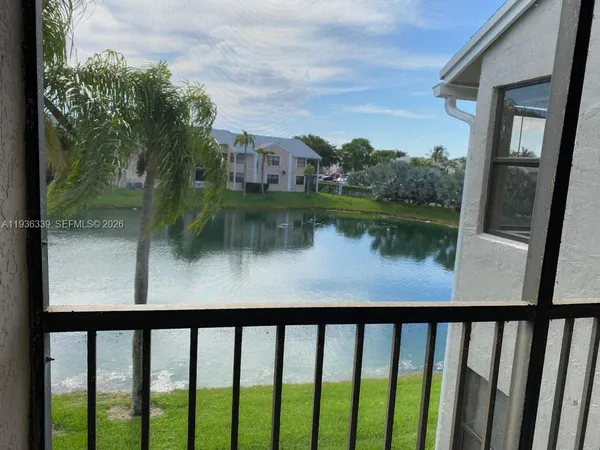a view of a lake from a balcony