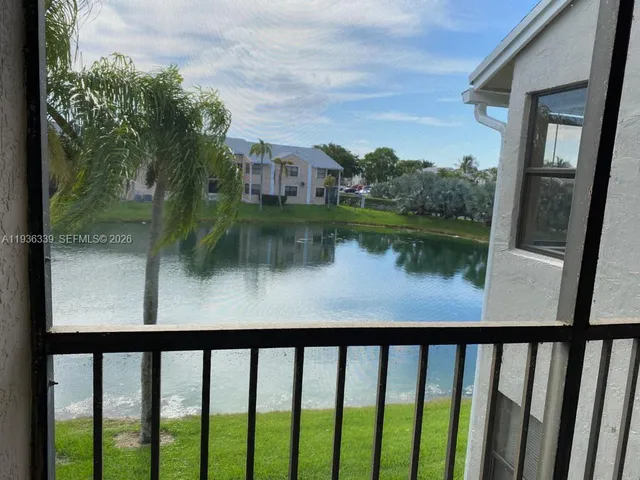 a view of a lake from a balcony