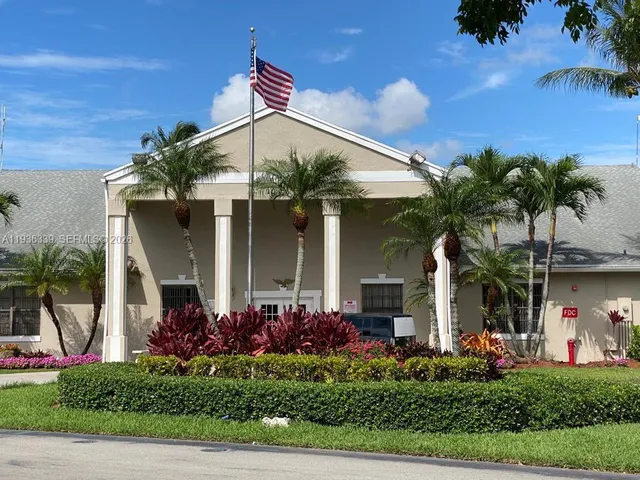 a view of a lake with a yard