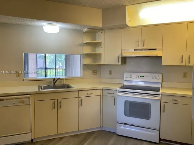 a white bath tub sitting in a bathroom