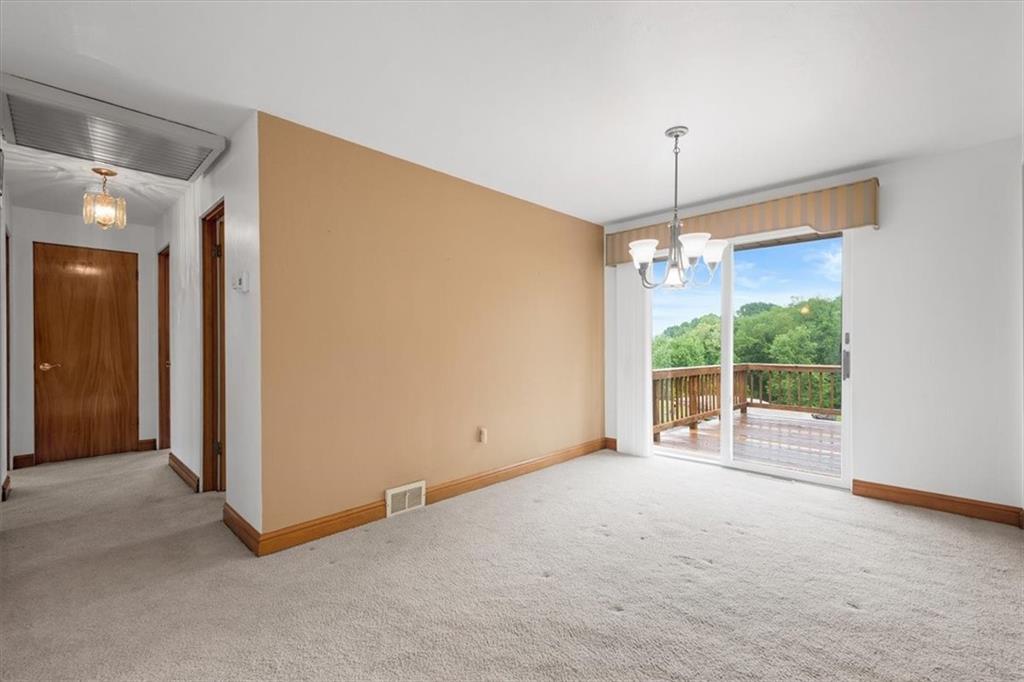 1020 Silver Lane McKees Rocks, PA 15136 - Photo 12 of 36 a view of empty room with ceiling fan and window