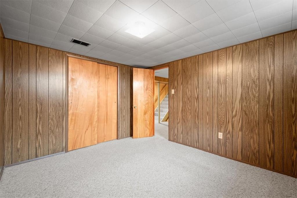 1020 Silver Lane McKees Rocks, PA 15136 - Photo 22 of 36 a view of empty room with wooden walls