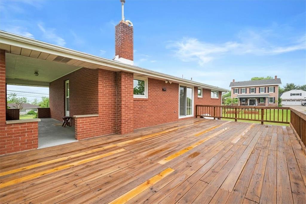 1020 Silver Lane McKees Rocks, PA 15136 - Photo 30 of 36 a view of a balcony with wooden floor and fence