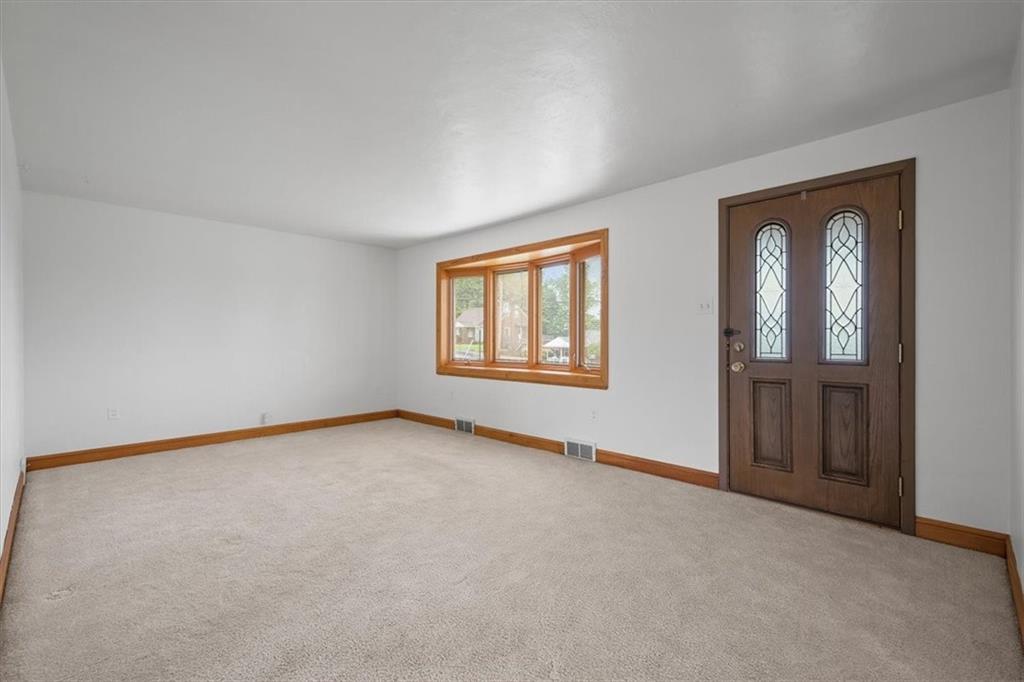 1020 Silver Lane McKees Rocks, PA 15136 - Photo 3 of 36 an empty room with windows and closet