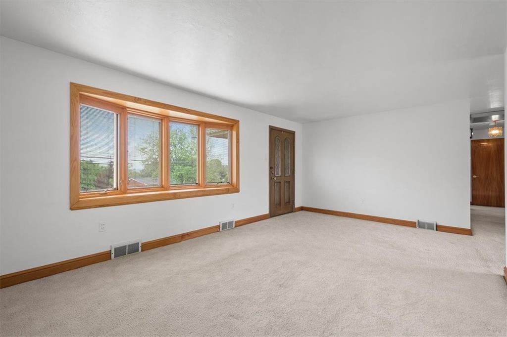 1020 Silver Lane McKees Rocks, PA 15136 - Photo 4 of 36 a view of an empty room with a window