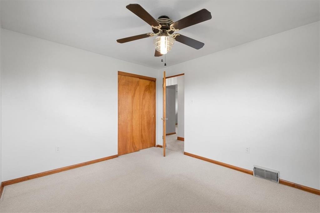 1020 Silver Lane McKees Rocks, PA 15136 - Photo 8 of 36 an empty room and a chandelier fan