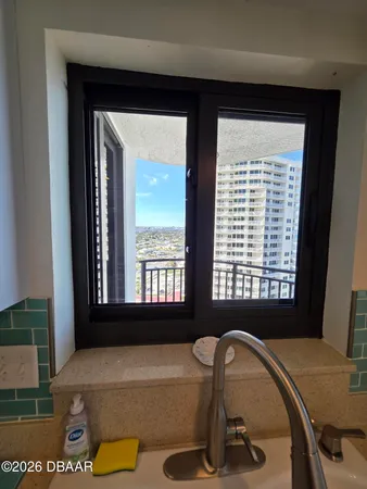 a room with a bed and a window