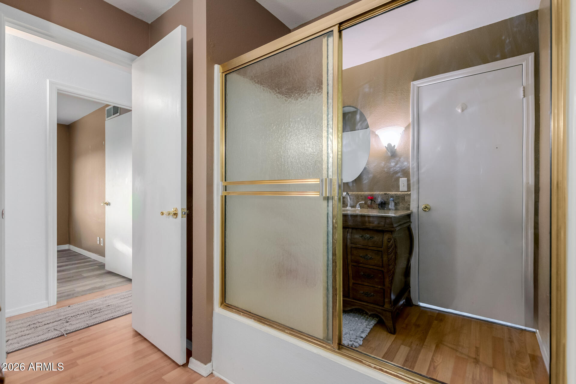 9403 East Cisco Road Mesa, AZ 85207 - Photo 11 of 20 a kitchen with a refrigerator and wooden floor
