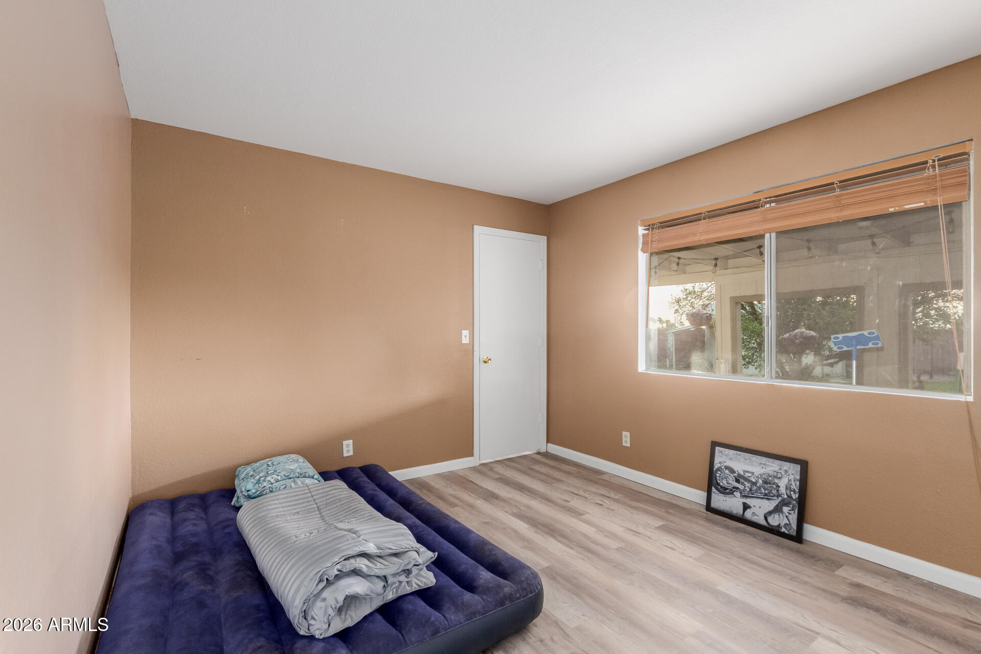 9403 East Cisco Road Mesa, AZ 85207 - Photo 13 of 20 a bedroom with a bed and a window