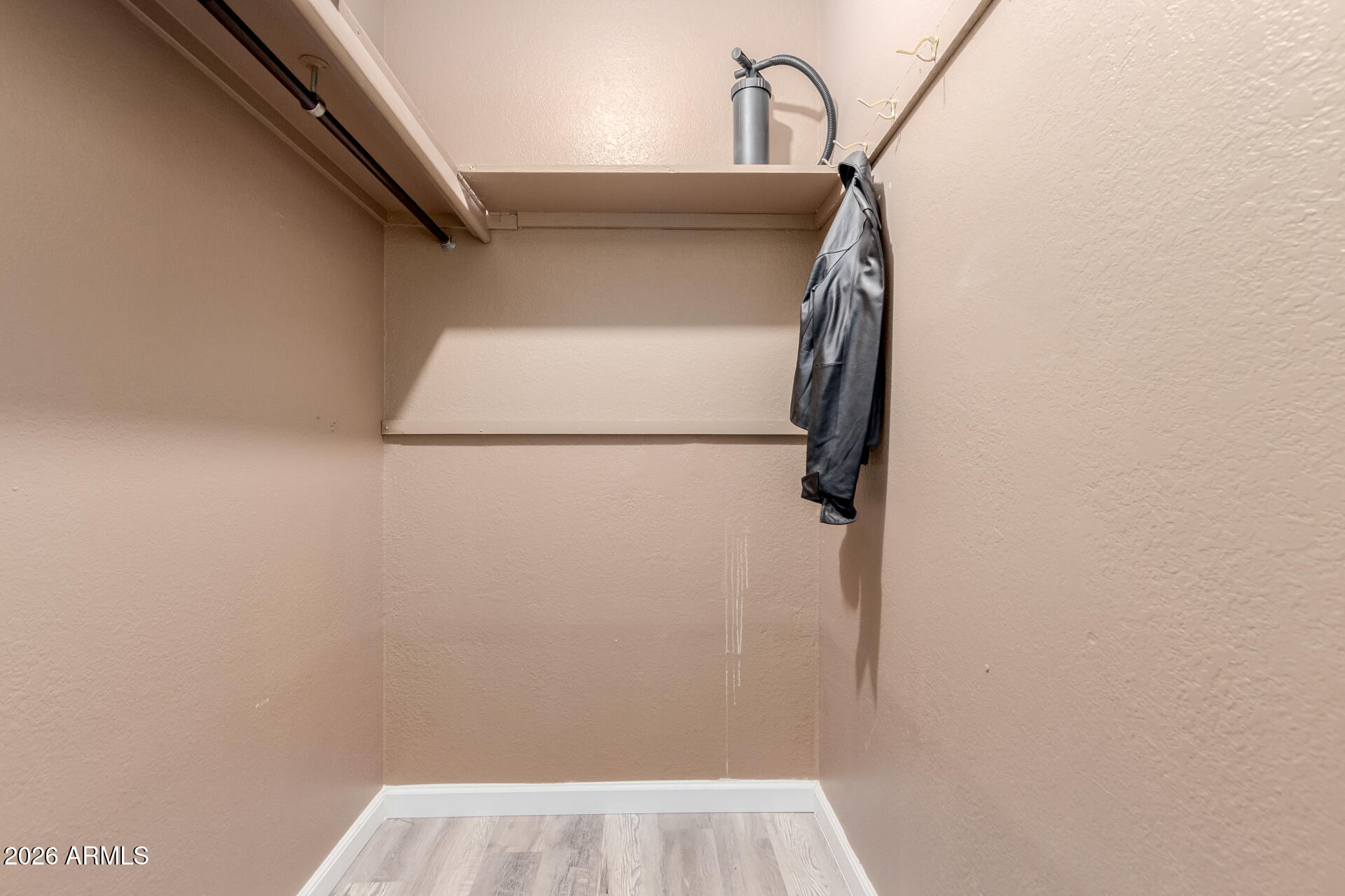 9403 East Cisco Road Mesa, AZ 85207 - Photo 14 of 20 a view of small space with racks on the wall