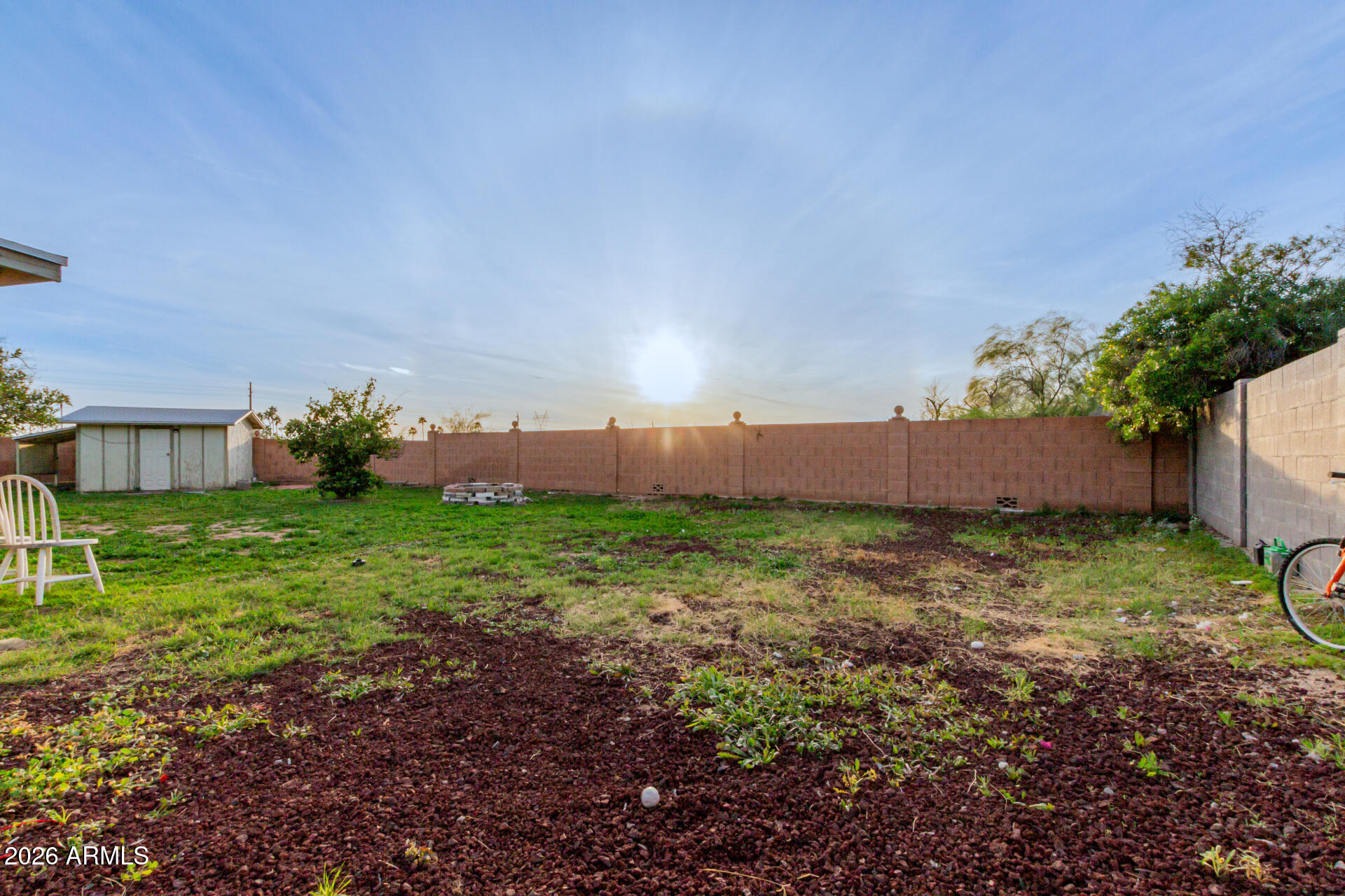 9403 East Cisco Road Mesa, AZ 85207 - Photo 16 of 20 a backyard of a house with lots of green space