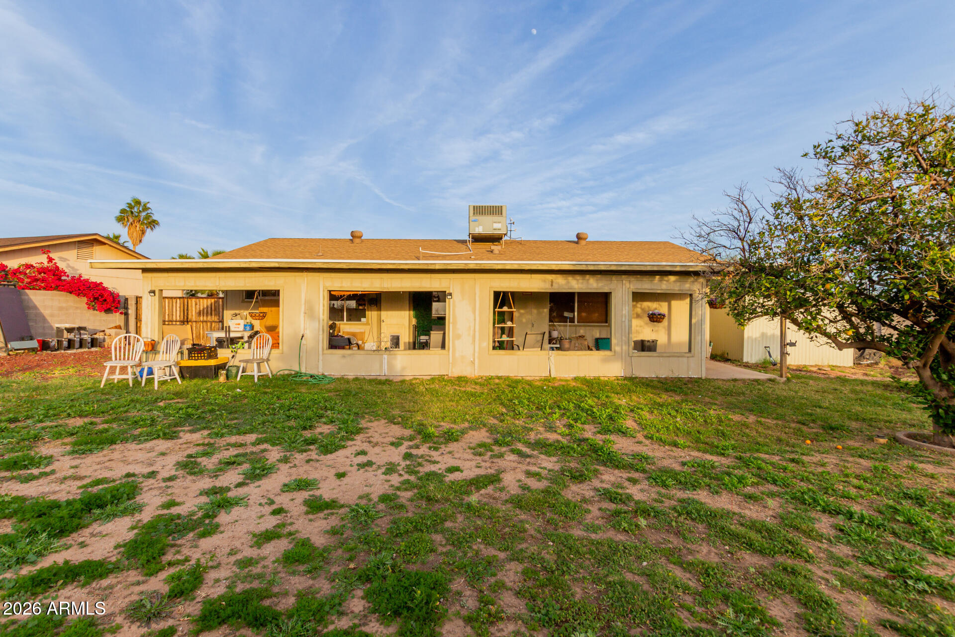 9403 East Cisco Road Mesa, AZ 85207 - Photo 17 of 20 a front view of a house with a yard