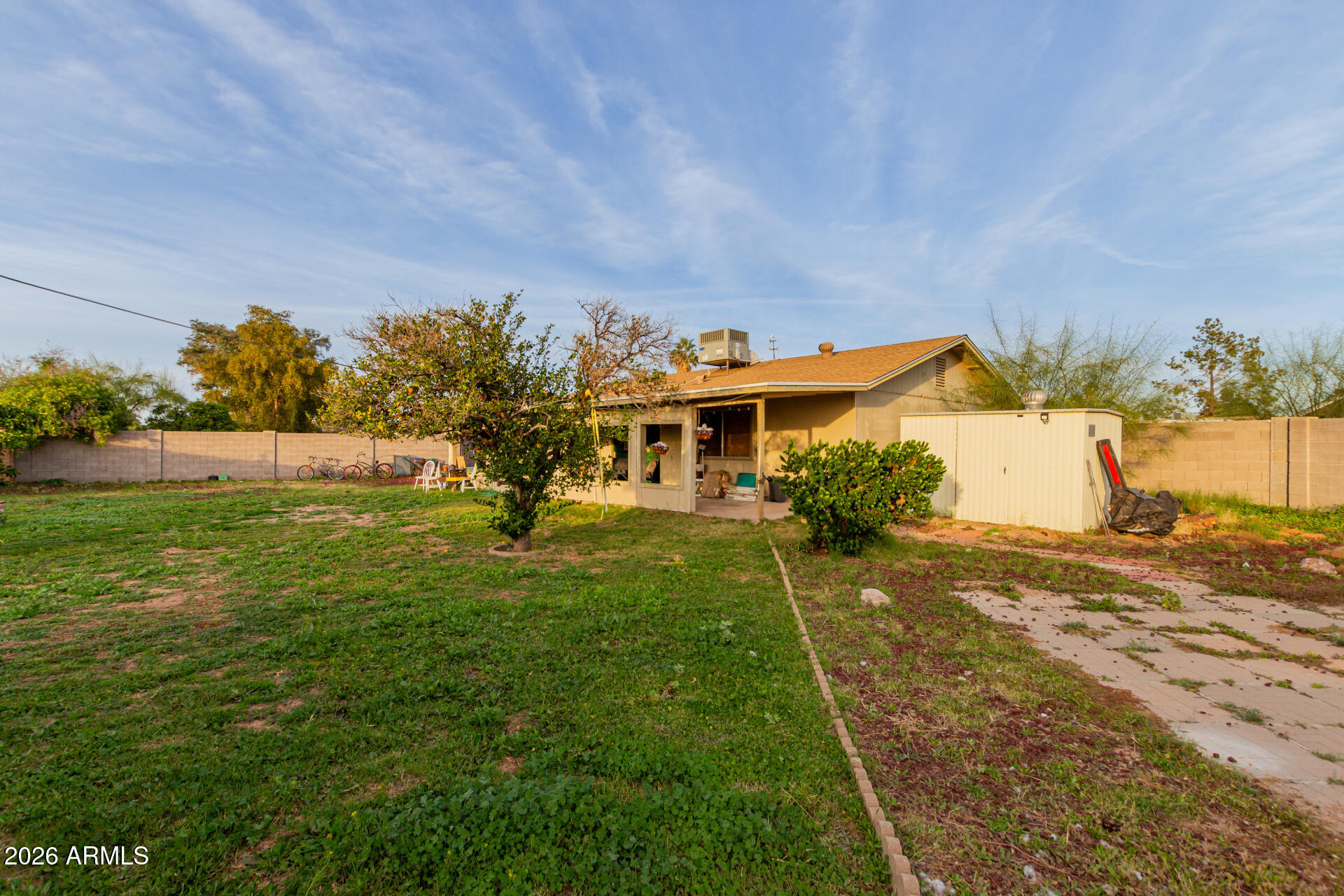 9403 East Cisco Road Mesa, AZ 85207 - Photo 18 of 20 a view of a house with a yard