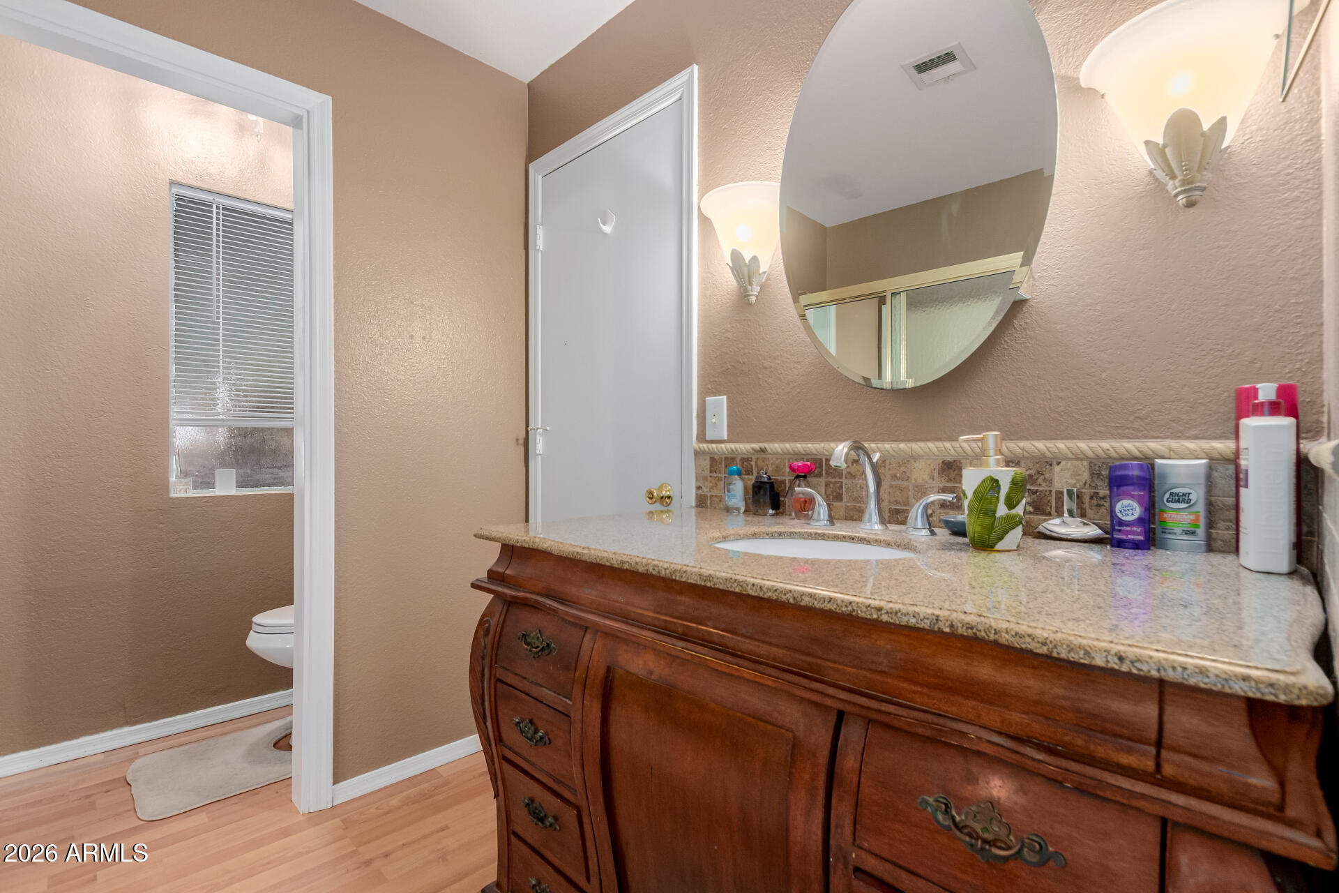 9403 East Cisco Road Mesa, AZ 85207 - Photo 7 of 20 a bathroom with a sink and a mirror