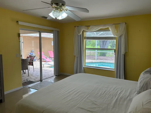 a bathroom with a mirror sink and vanity
