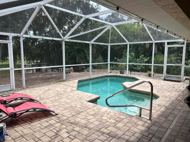 a view of a lounge chair on the patio