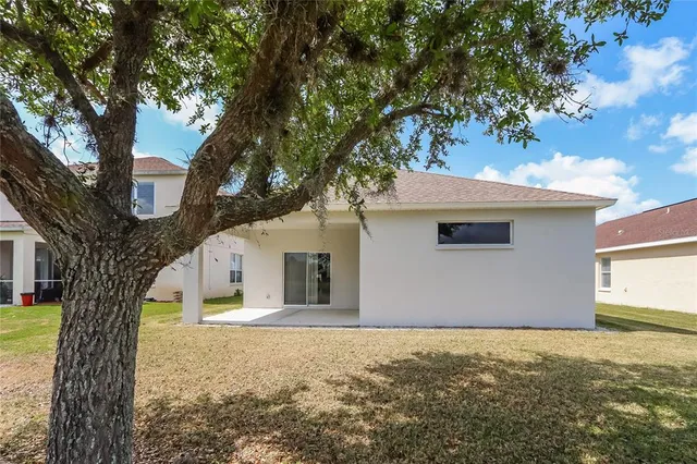 a house with trees in front of it