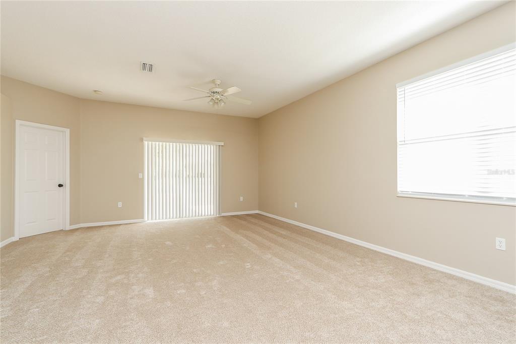 6239 Blue Runner Court Lakewood Ranch, FL 34202 - Photo 2 of 15 a view of an empty room with a window