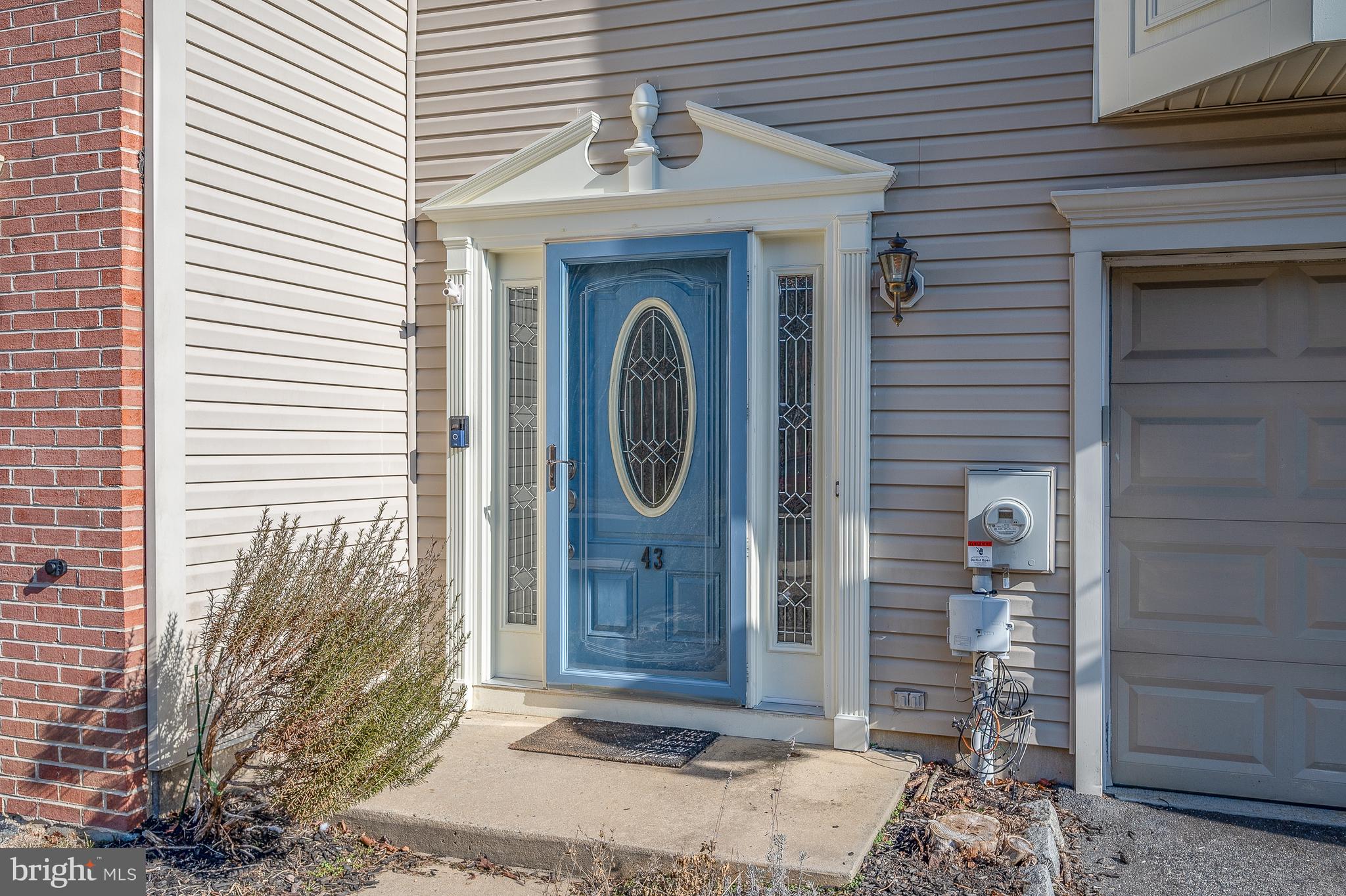 a front view of a house with a door