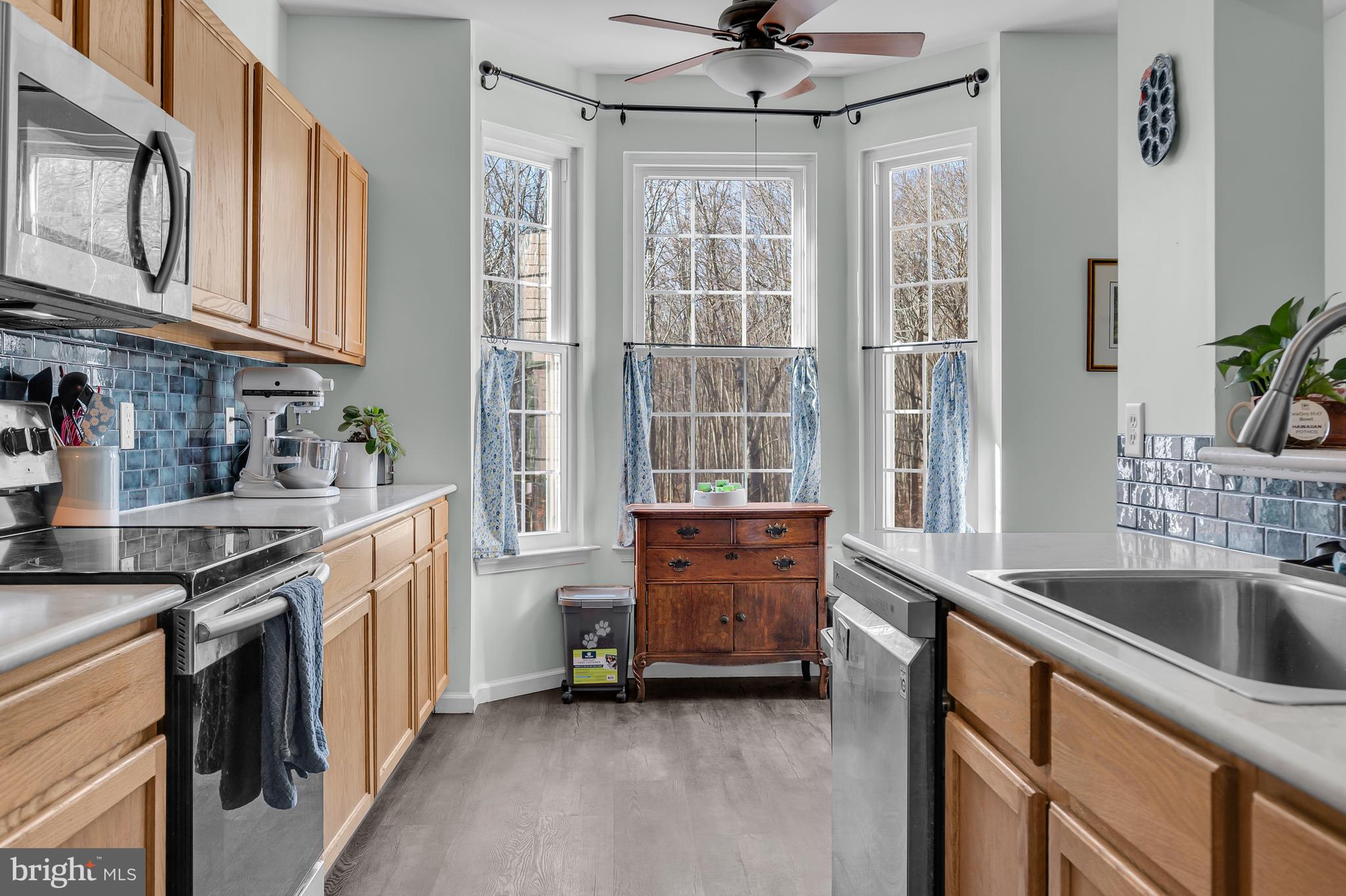 43 Wicklow Road Bear, DE 19701 - Photo 19 of 37 a kitchen that has a sink and a stove in it
