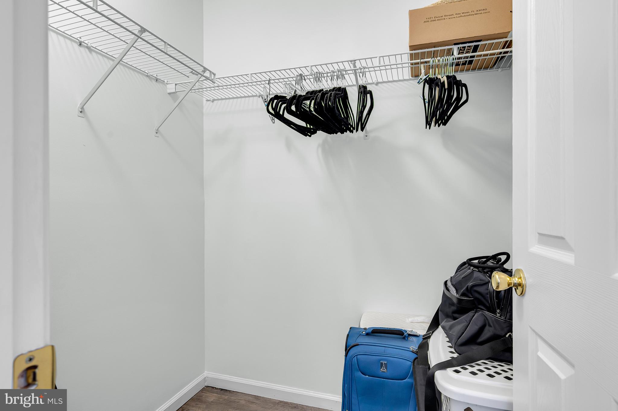 43 Wicklow Road Bear, DE 19701 - Photo 26 of 37 a view of walk in closet with clothes and shoes