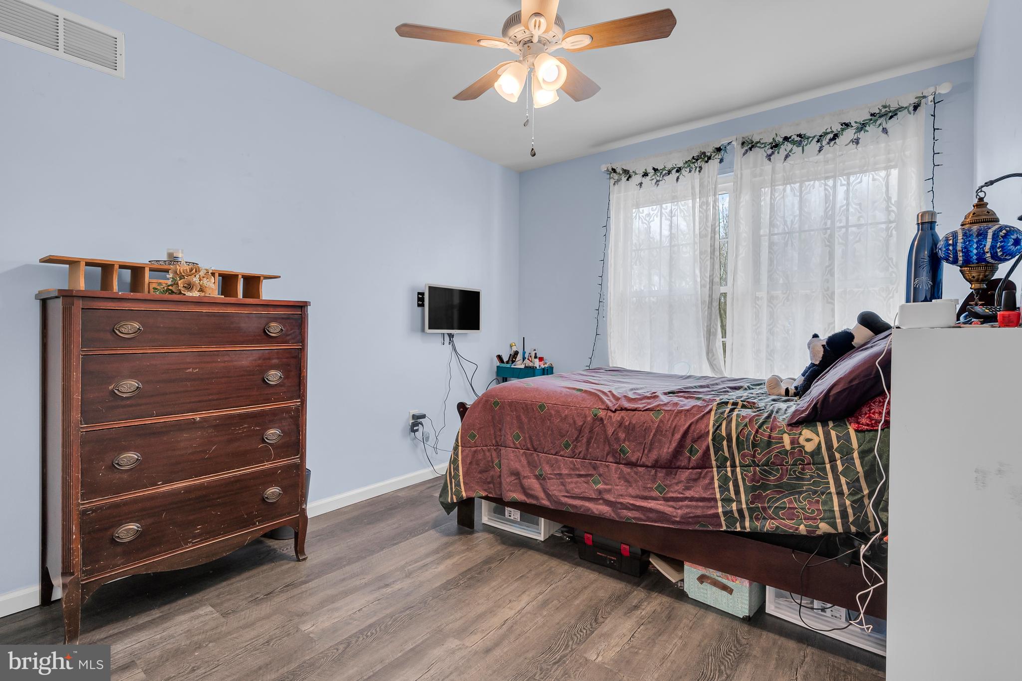 43 Wicklow Road Bear, DE 19701 - Photo 28 of 37 a bed room with a bed and a ceiling fan